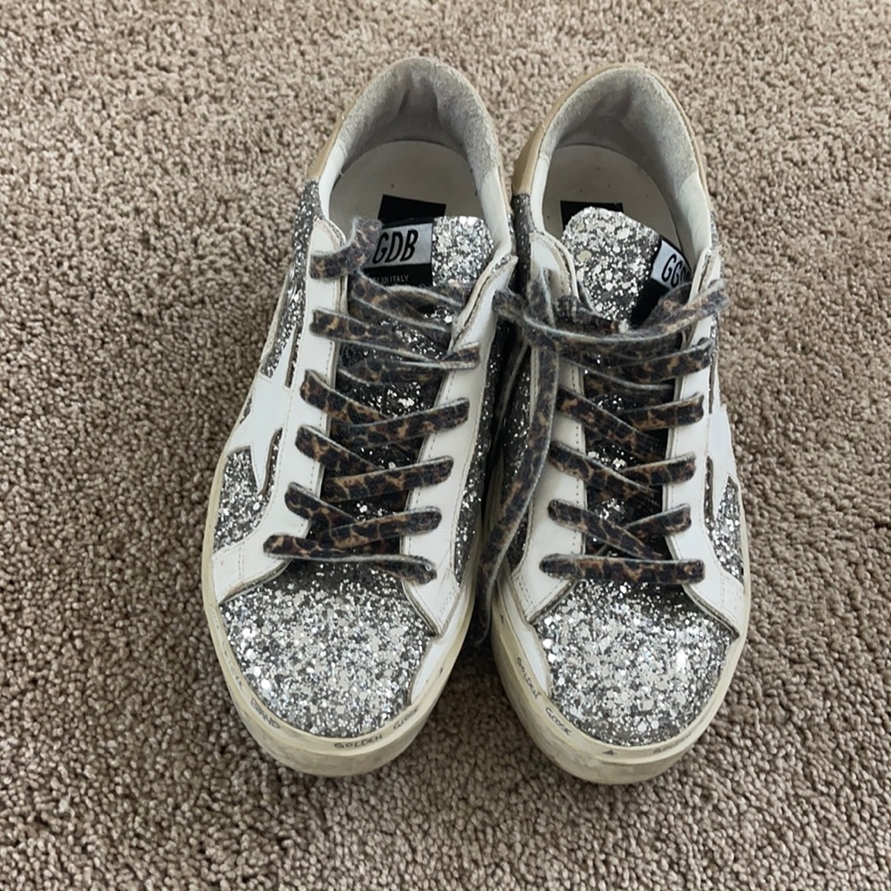 Golden goose hi star 2021 with glitters worn twice too heavy for me like new.